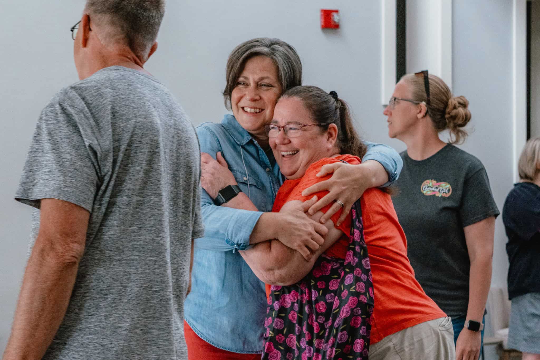 Smile of joy at a church gathering in Indianapolis reflecting community and faith.